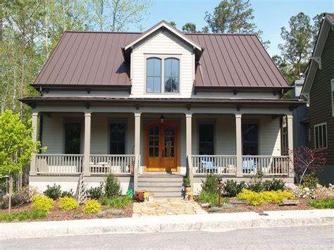 gold color house with brown metal roof|siding colors for brown roof.